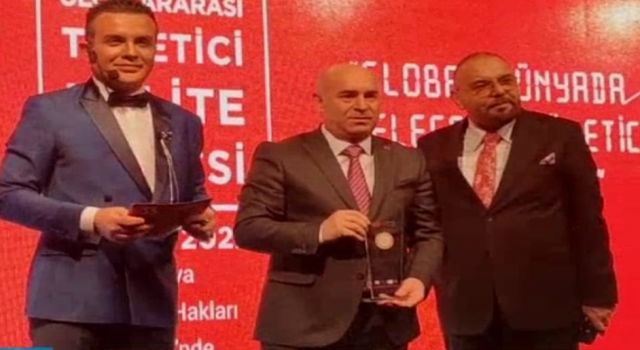 ADİL KOÇALAN'A MESLEKTE BAŞARI ÖDÜLÜ