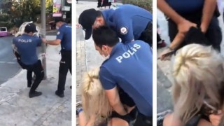 Maske takmadığı için bir kadını gözaltına alan 2 polise uzaklaştırma